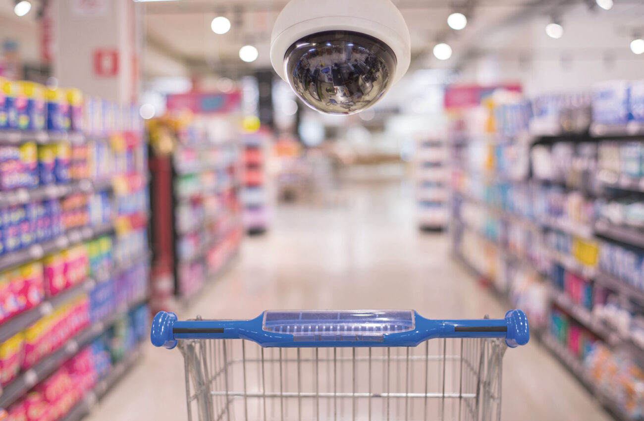 CCTV and blurred supermarket store blur background. Business pro